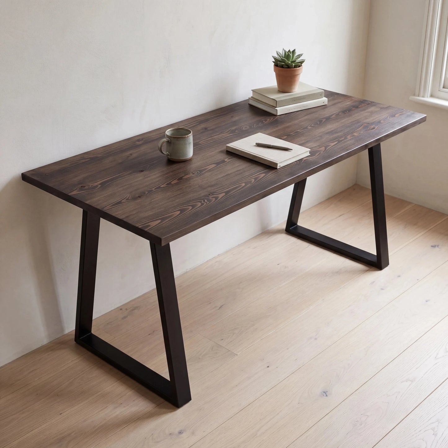 Grove Solid Wood Desk, Espresso finish, black trapezium legs, lifestyle