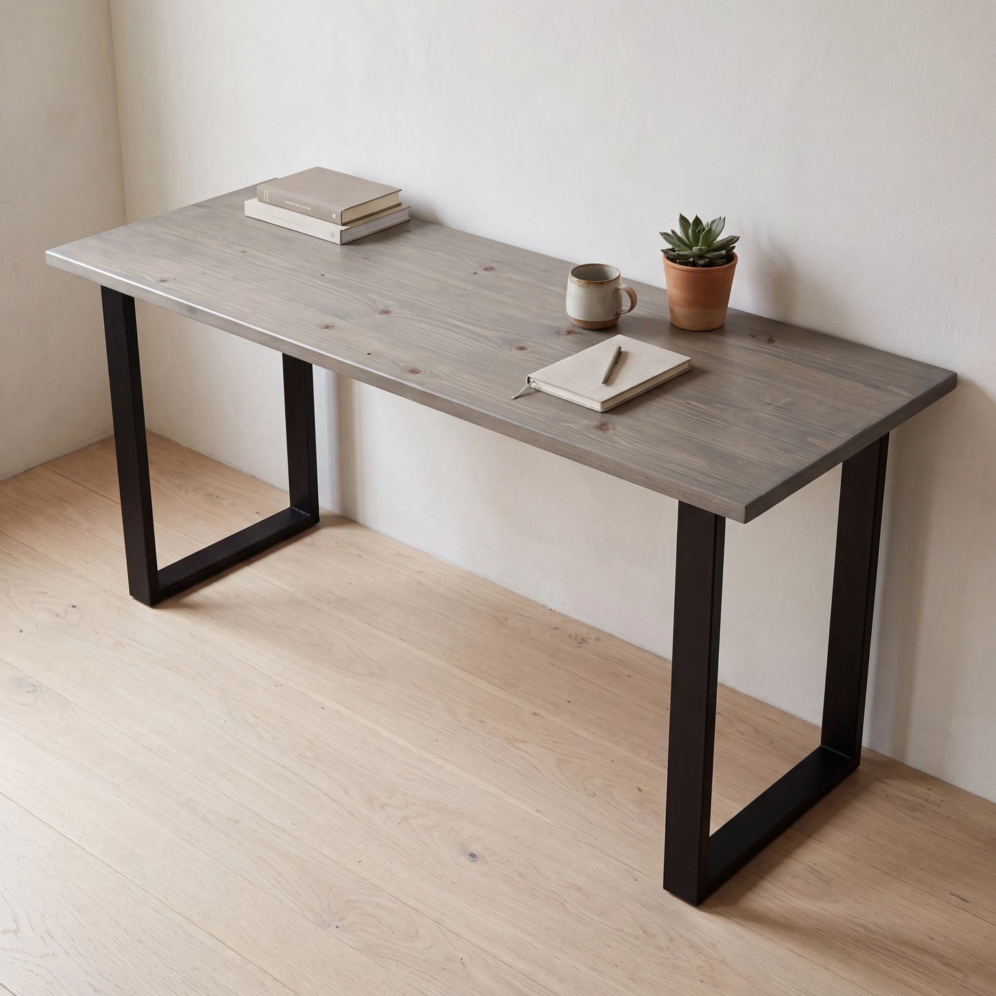 Grove Solid Wood Desk, Graphite finish, black square legs, lifestyle