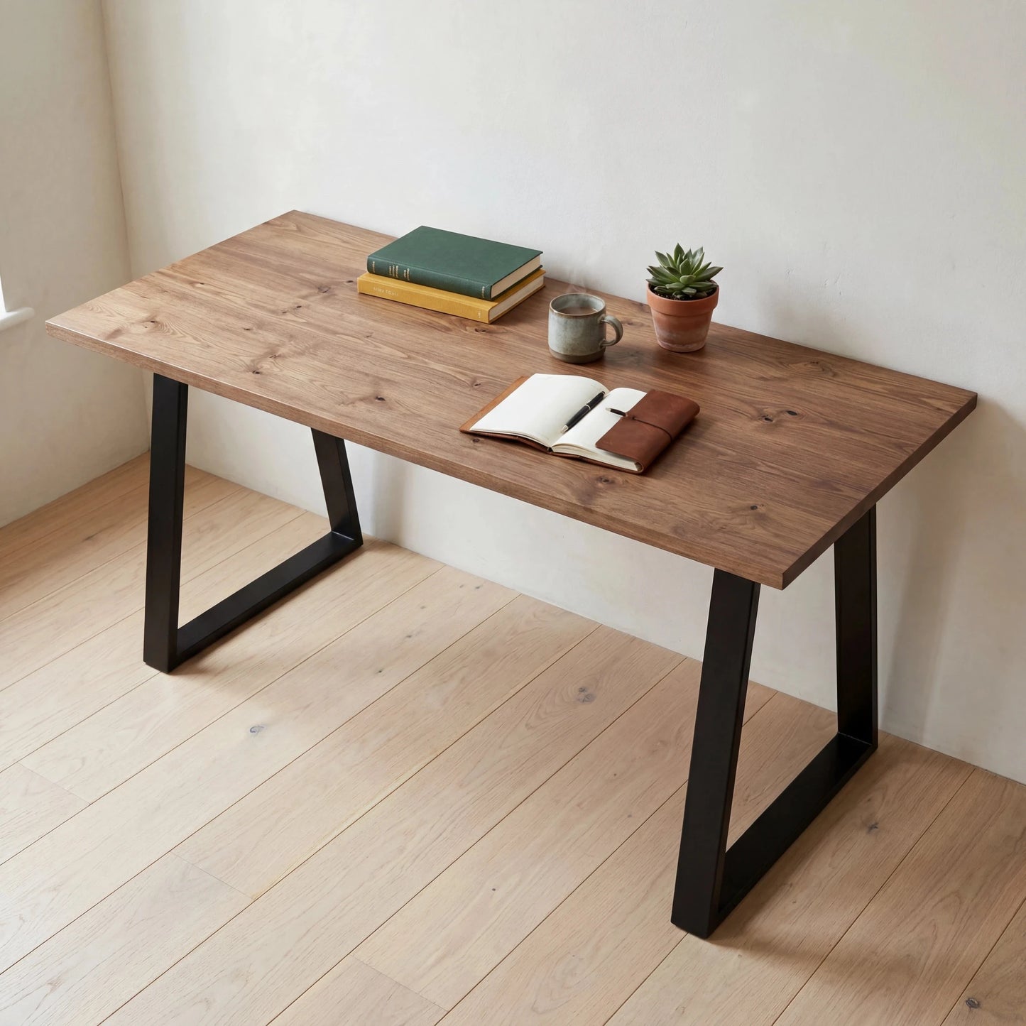 Grove Solid Wood Desk, Tobacco finish, black trapezium legs, lifestyle