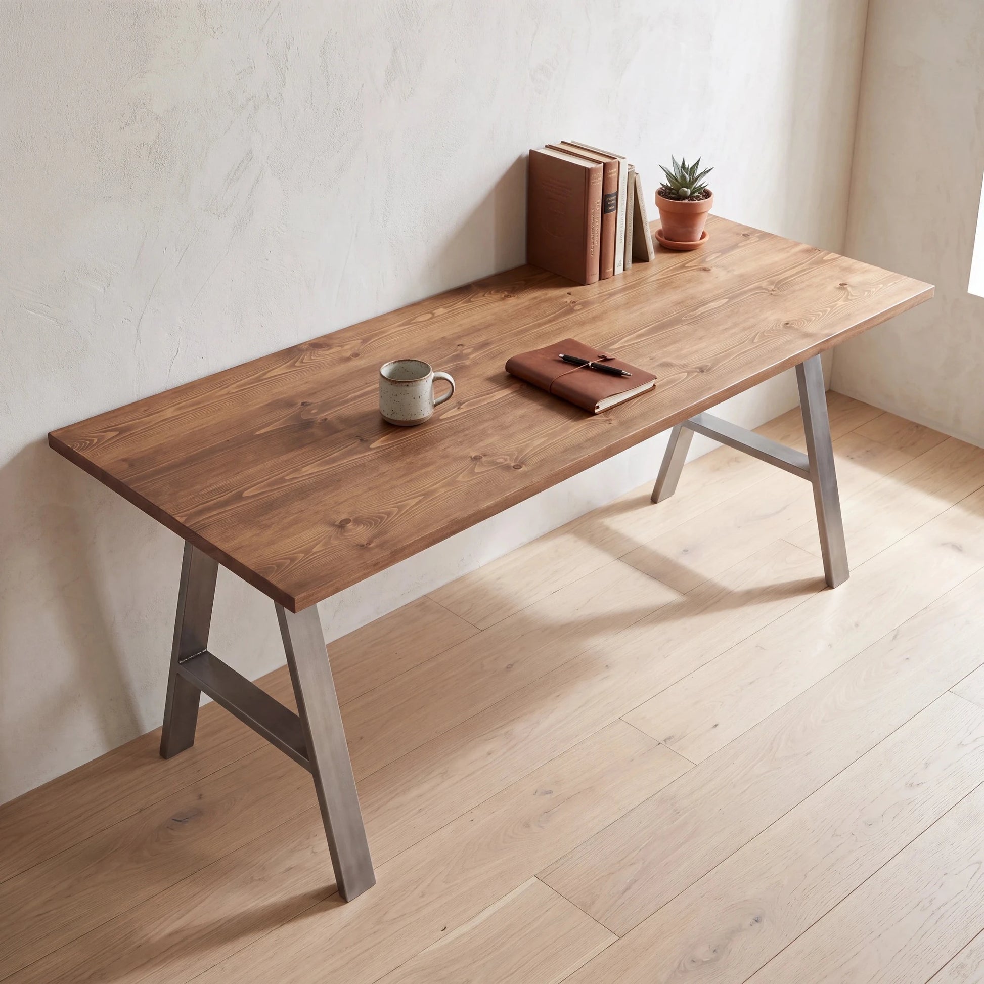 Grove Solid Wood Desk, Tobacco finish, steel A-frame legs, lifestyle