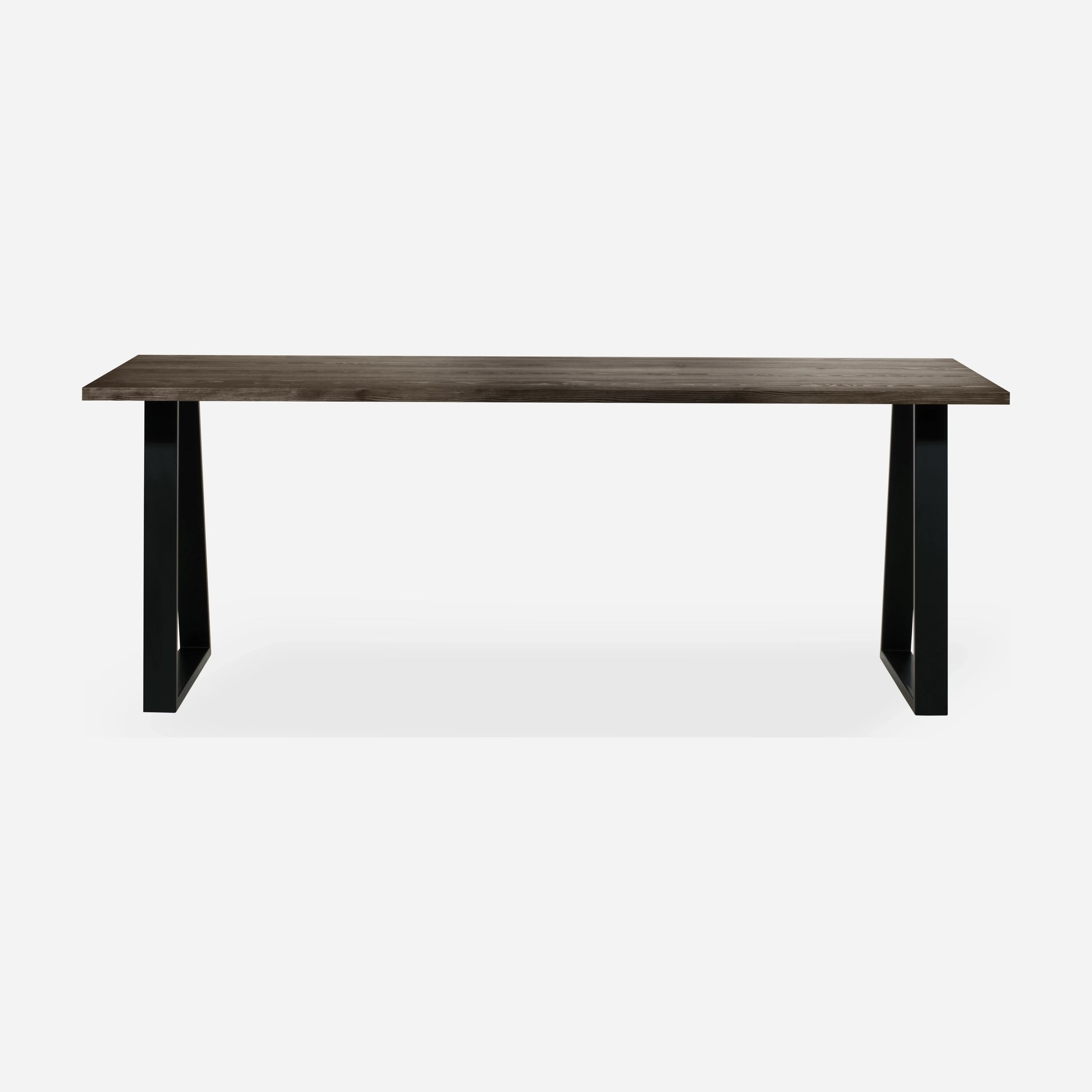 Grove solid wood desk in Espresso with black trapezium legs