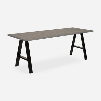 Grove solid wood desk in Graphite with black A-frame legs
