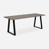Grove solid wood desk in Graphite with black trapezium legs