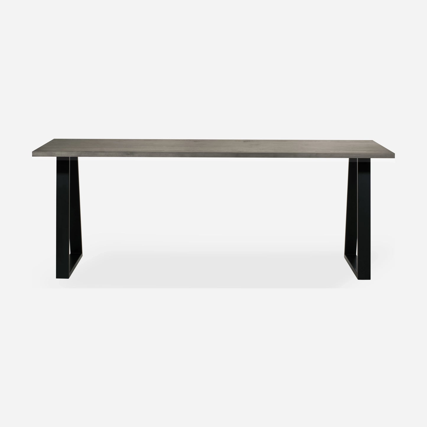 Grove solid wood desk in Graphite with black trapezium legs