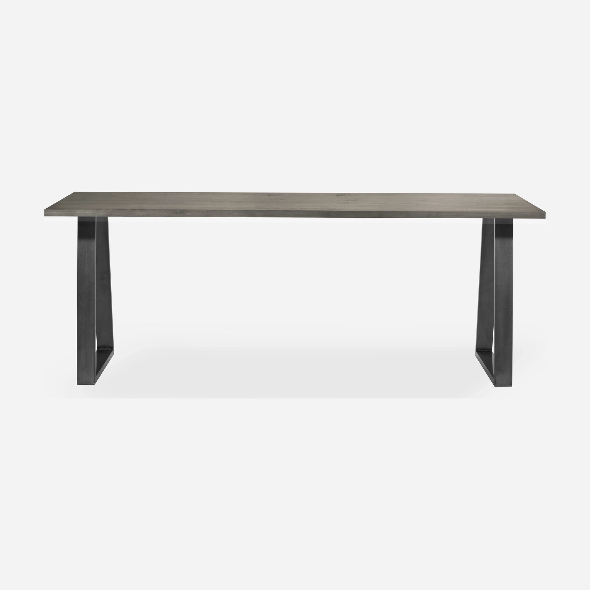 Grove solid wood desk in Graphite with steel trapezium legs