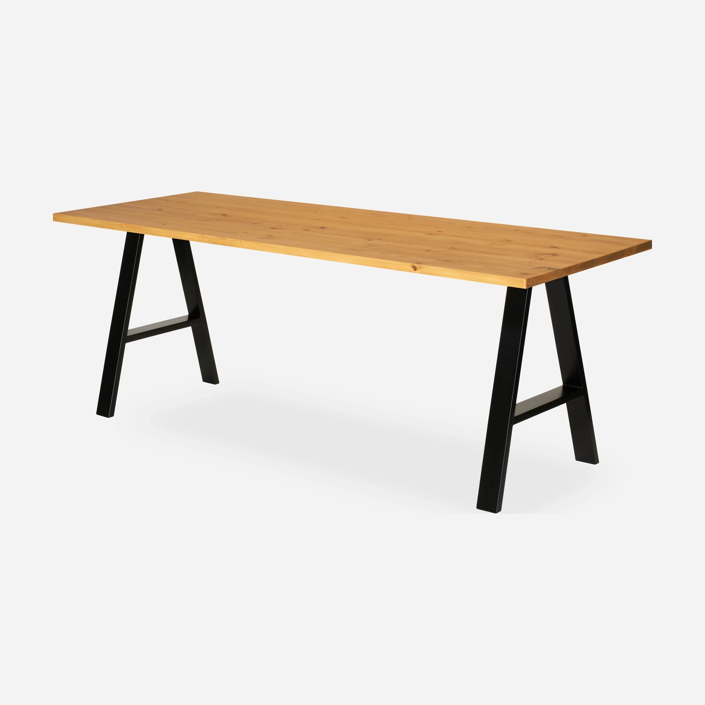 Grove solid wood desk in Honey with black A-frame legs