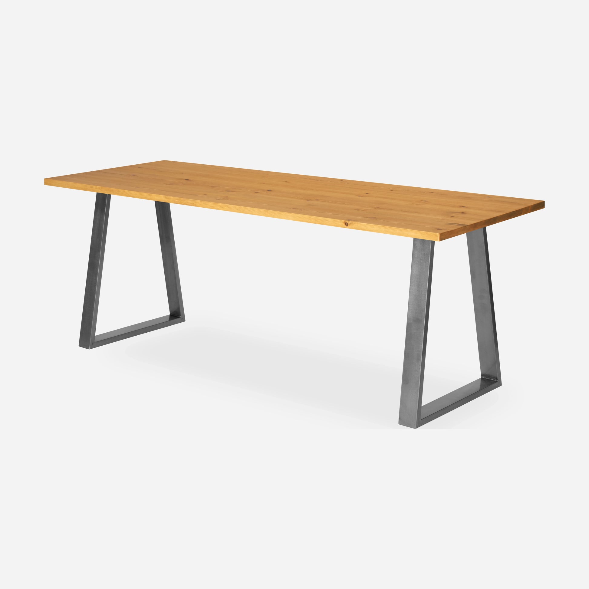 Grove solid wood desk in Honey with steel trapezium legs
