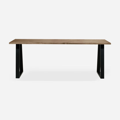 Grove solid wood desk in Tobacco with black trapezium legs