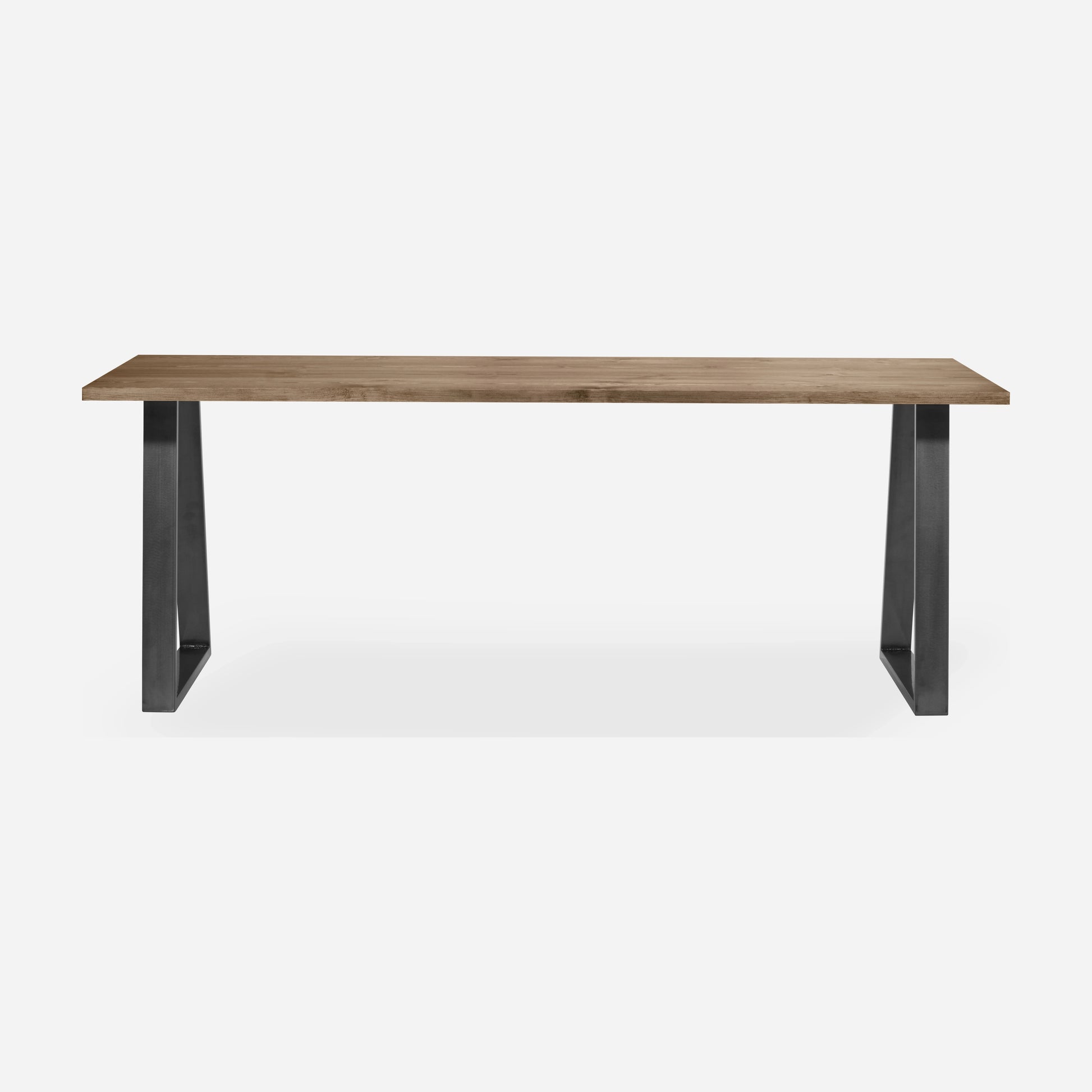 Grove solid wood desk in Tobacco with steel trapezium legs